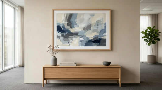 A framed original abstract painting on a neutral office wall, corporate holiday art gifting from VanArtHub