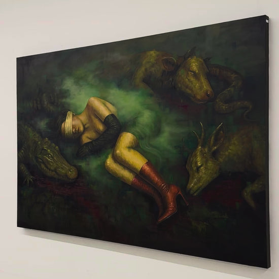 Video of Second Skin by Phaedra on a white wall, moving in from the side toward the sleeping woman and the crocodile