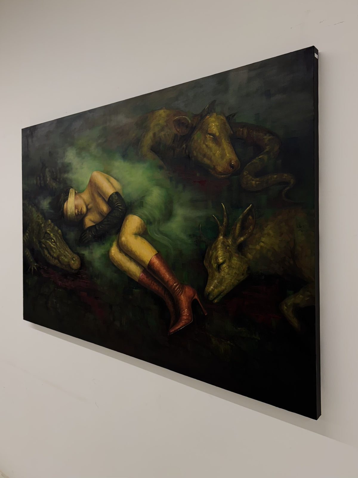 Second Skin by Phaedra hanging on a white wall, seen from the left, showing the large 100 x 150 cm canvas and its dark painted edge