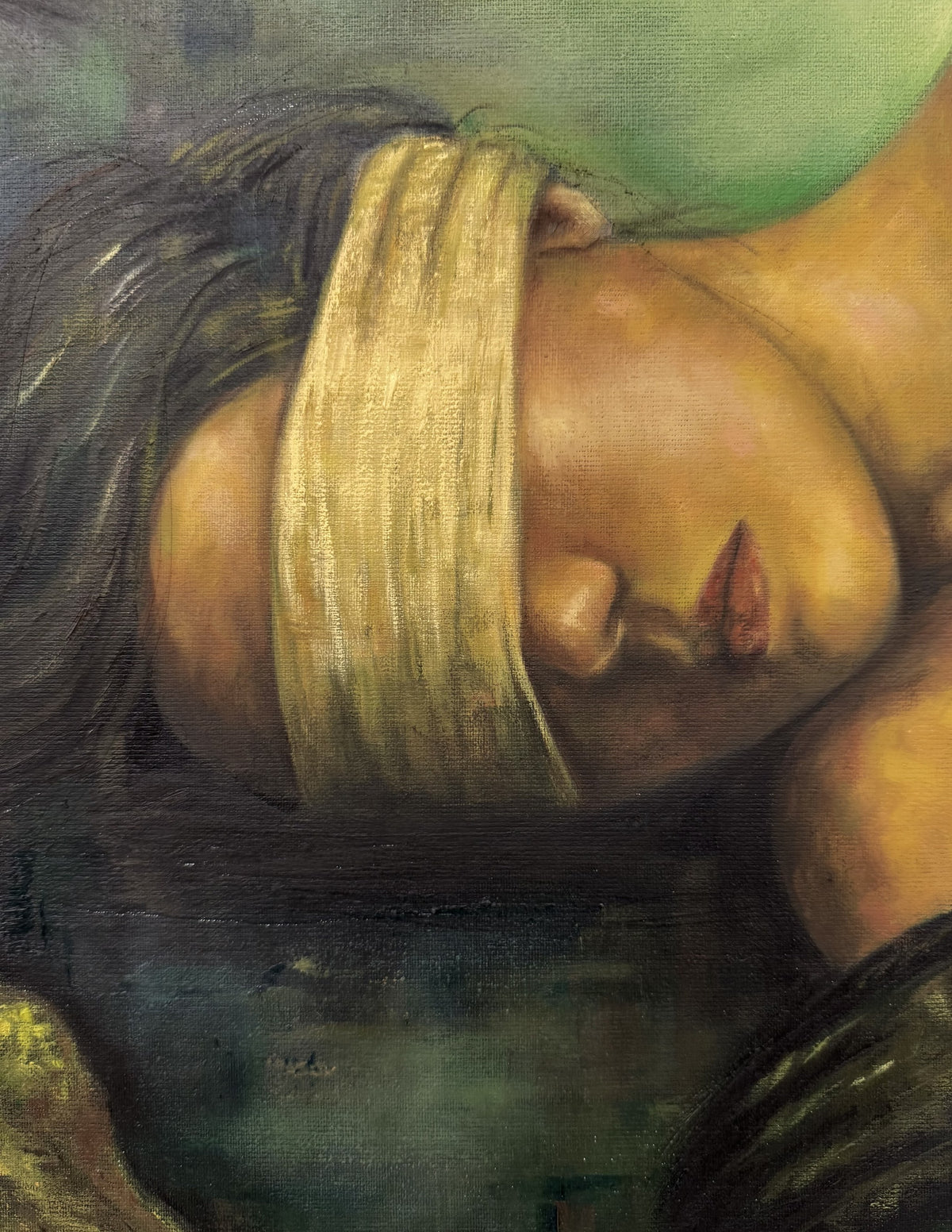 Detail of Second Skin by Phaedra: the sleeping woman's face in profile, eyes covered by a pale ochre blindfold, dark hair against green mist